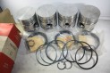 JEU DE 4 PISTONS+SEGMENTS PERKINS 50215...CAMIONS UTILITAIRES TRACT...