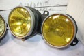PAIRE DE BLOCS OPTIQUES DOUBLE JAUNE D/G HELLA H1/H1...BMW E30 PHASE 1